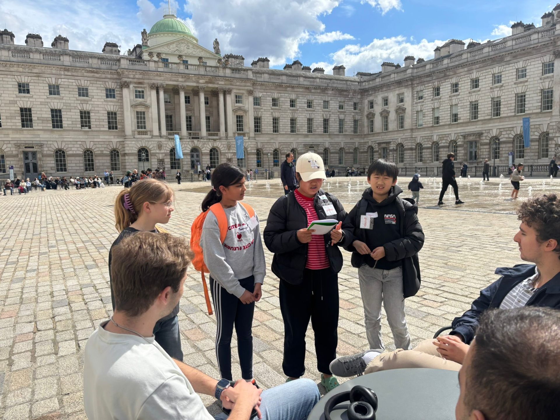 Students on the King's Strand campus, testing ideas with strangers.
